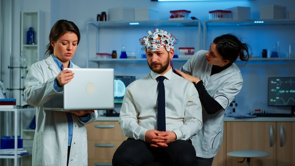 Genetic counseling session with doctors explaining DNA results to patients