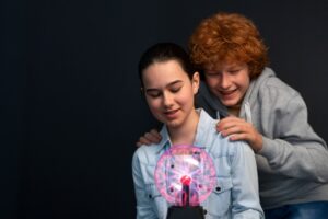 Pediatric neurologist consulting with a child on congenital neurological disorders, genetics, and brain health